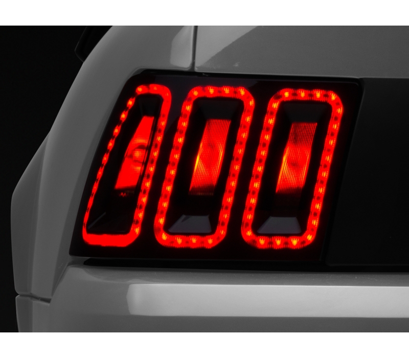 Raxiom 99-04 Ford Mustang Excluding 99-01 Cobra Icon LED Tail Lights- Black Housing (Smoked Lens)